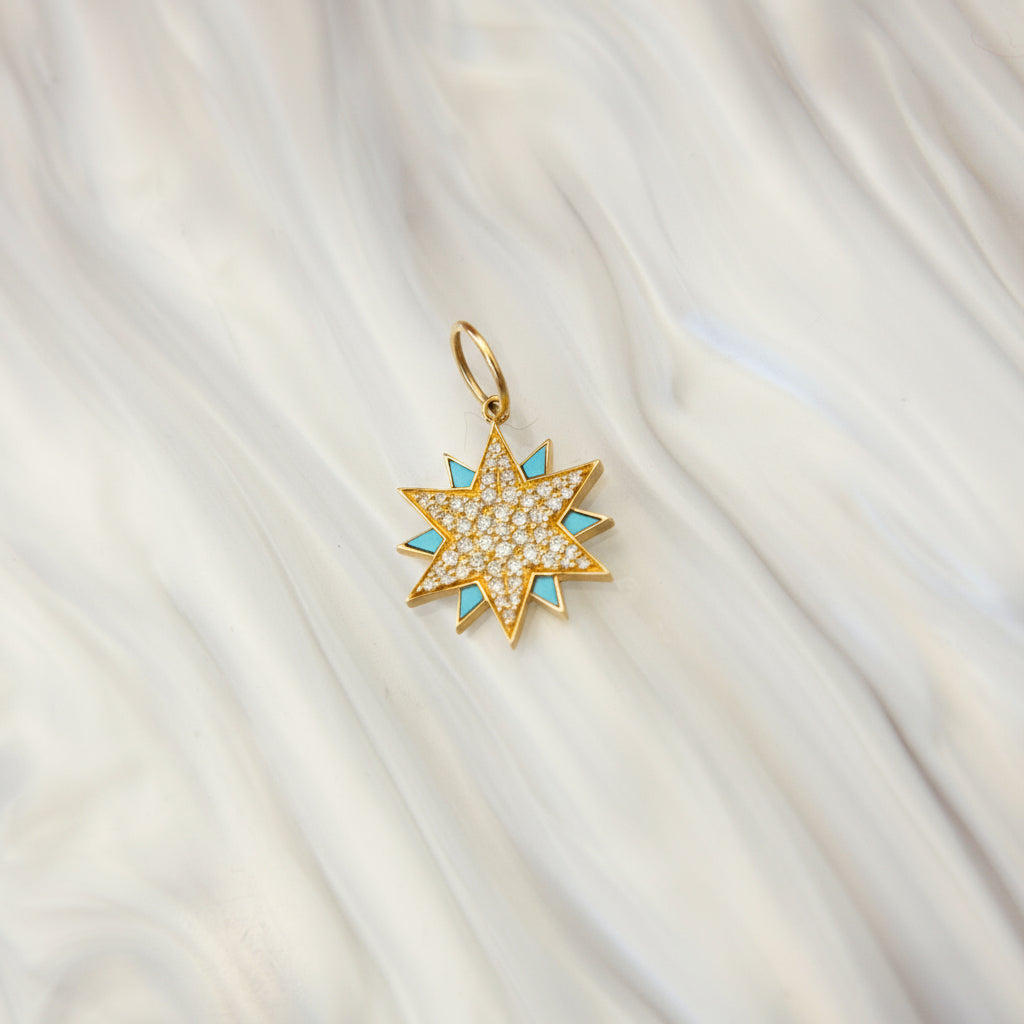Gold star-shaped pendant with turquoise accents