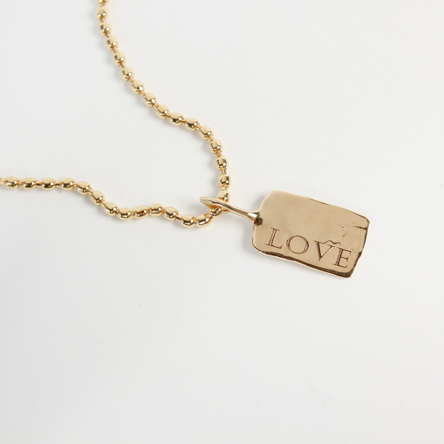 The LOVE Tag Charm