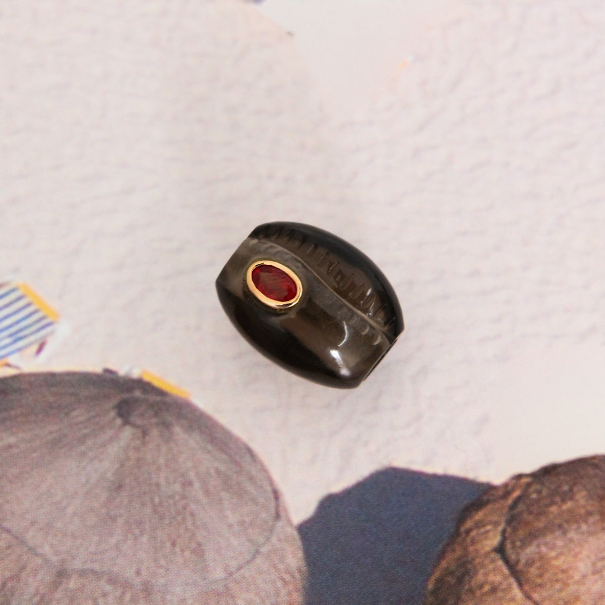 Cowry Bead with Garnet Charm
