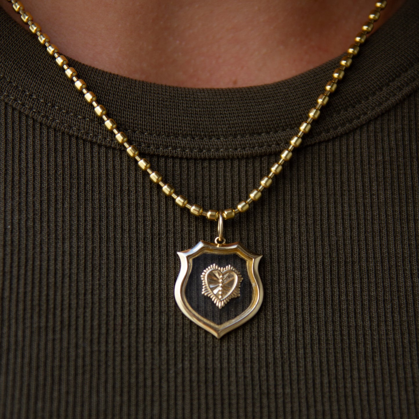 Louise Topaz & Gold Shield Charm