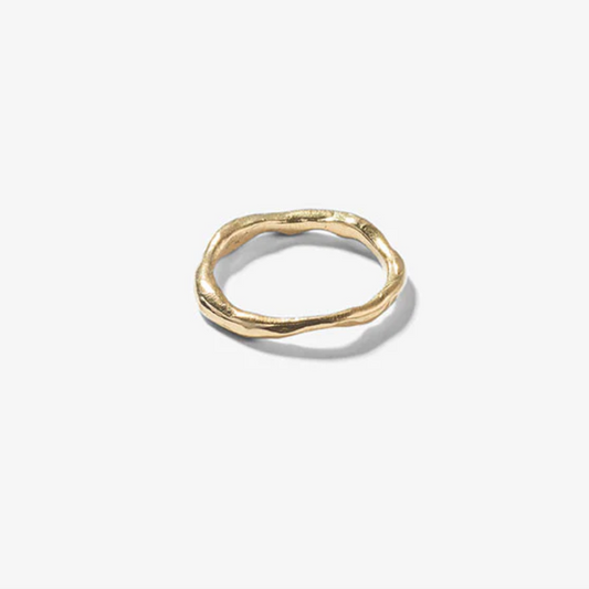 Gold ring on a white background