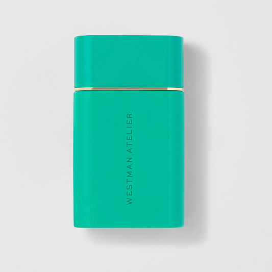 Green rectangular product with 'Westman Atelier' branding on a light gray background