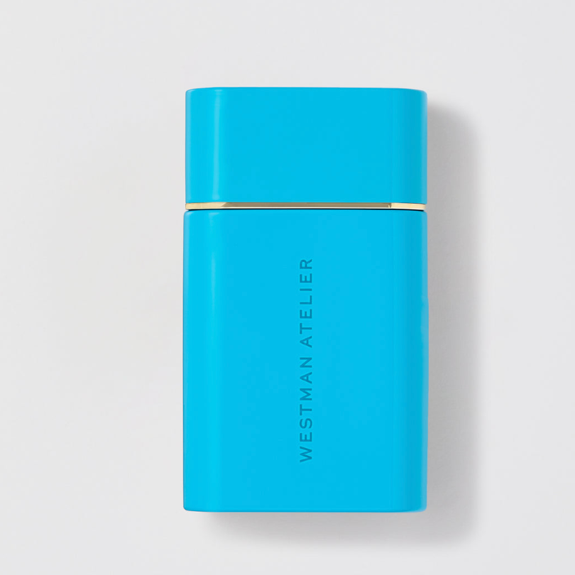 Blue rectangular product with 'Westman Atelier' branding on a light gray background